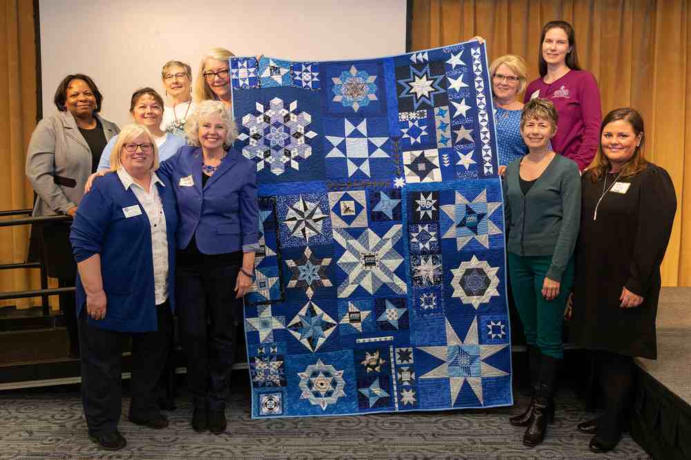 Marcia Haas, campus women honored at event
